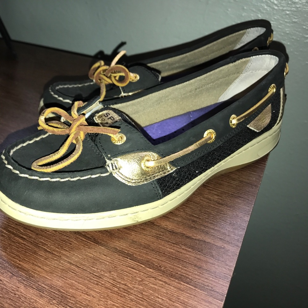 Gently used gold/black Sperry shoes